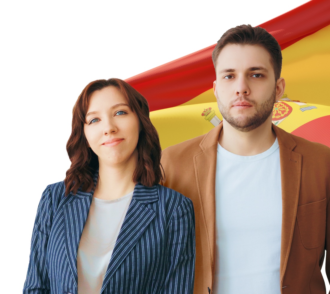 Olga and Nikita — the El Relocator team in front of the Spanish flag
